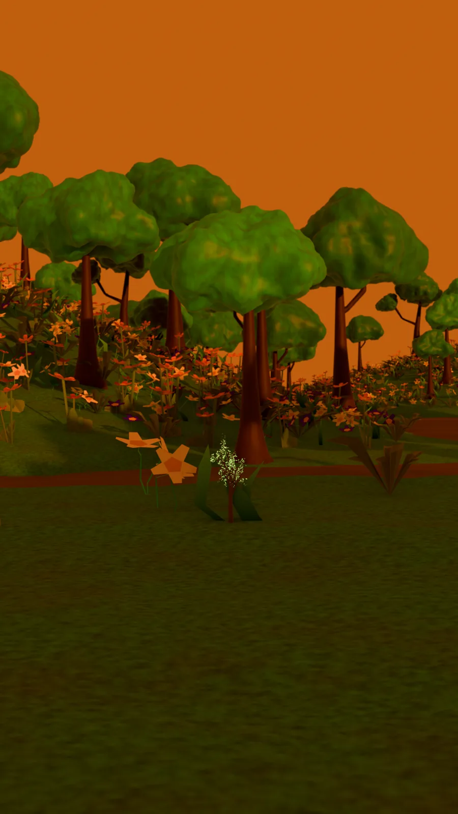 A treeline under an orange evening sky, with the road running away into the distance.